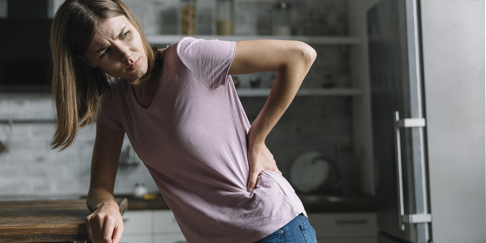 Почему болит поясница слева?